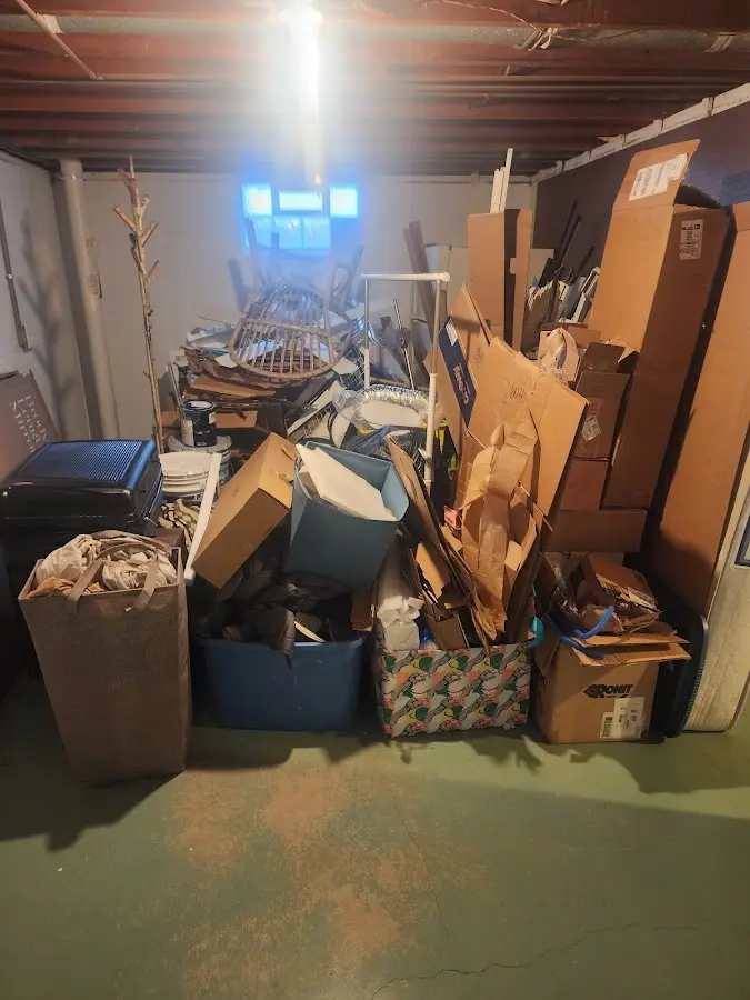 Roll-off dumpster container at job site for Construction Dumpster Rental in Cohasset